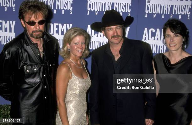 Ronnie Dunn and wife Janine Dunn, and Kix Brooks and wife Barbara Brooks