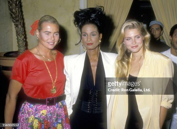 Model/Actress Margaux Hemingway, Model Beverly Johnson, and Model Kim Alexis attend the 'You Can Do Something About AIDS' Benefit on June 13, 1988 at...