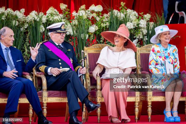 Prince Lorenz of Belgium, Prince Laurent of Belgium, Princess Claire of Belgium and Princess Delphine of Belgium attend the te military parade at the...
