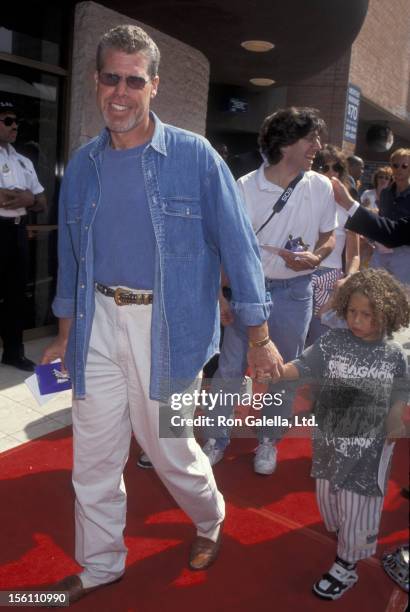 Actor Ron Perlman and son Brandon Perlman attend the premiere of 'Mighty Morphin Power Rangers-The Movie' on June 24, 1995 at Mann National Theater...