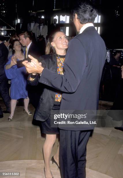 Actress Ann Reinking and Actor Tommy Tune attend the Tea Dance Gala to Kick-Off the Beginning of Ballroom Week '90 on May 31, 1990 at the Rainbow...
