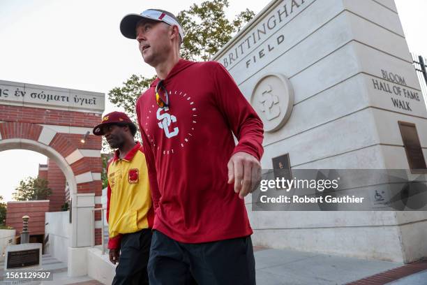 Los Angeles, CA, Friday, July 28, 2013 - USC Trojans head coach Lincoln Riley on his way to practice at Dedeaux Field.