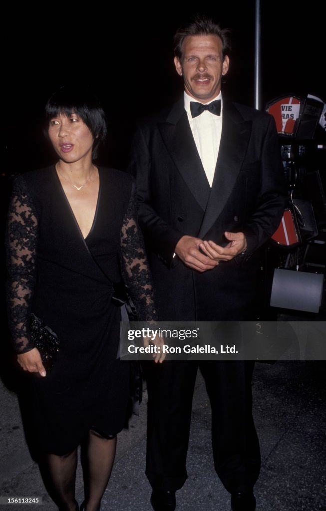 Actor Marc Singer and wife Haunani Minn attending the opening of