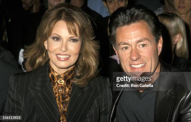 Raquel Welch and Richard Palmer during Escada Spring 2001 Fashion Show at Pier 2 in New York City, New York, United States.