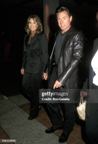 Raquel Welch and Richard Palmer during Escada Spring 2001 Fashion Show at Pier 2 in New York City, New York, United States.
