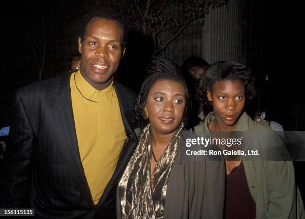 Actor Danny Glover, wife Asake Bomani and Mandisa Glover attending the premiere of 'Predator 2' on November 19, 1990 at Westwood Avco Theater in...