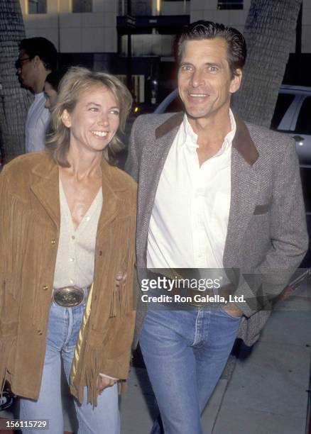 Actor Dirk Benedict and wife actress Toni Hudson attend the 'City Slickers II: The Legend of Curly's Gold' Beverly Hills Premiere on June 8, 1994 at...