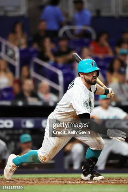 Jon Berti of the Miami Marlins hits a single during the eighth inning of the game between the Detroit Tigers and the Miami Marlins at loanDepot park...