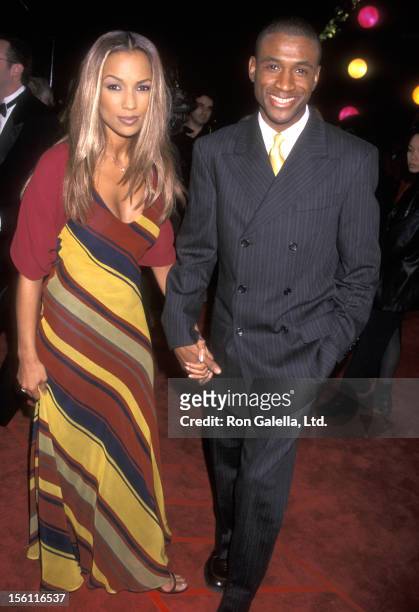 Comedian Tommy Davidson and wife attend the 12th Annual American Comedy Awards on February 22, 1998 at Shrine Auditorium in Los Angeles, California.