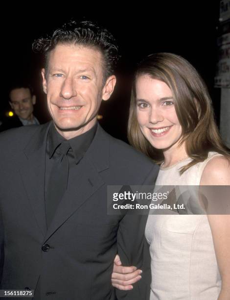 Musician Lyle Lovett and girlfriend April Kimble attend the 'Cookie's Fortune' Hollywood Premiere on March 29, 1999 at Cineplex Odeon Showcase...