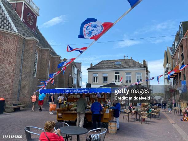 tourists in a dutch city - market stall stock pictures, royalty-free photos & images