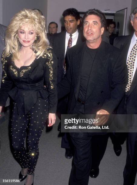 Musician Dolly Parton and Hollywood Manager/Producer Sandy Gallin attend the Grand Opening Celebration and Ribbon Cutting to Unveil the New Sony...