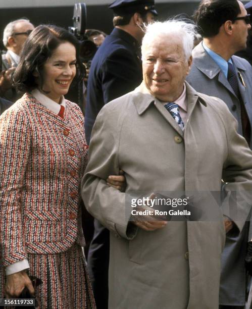 Actor Charlie Chaplin and wife Oona O'Neill Chaplin on April 7, 1972 arriving at the JFK Airport in New York City, New York.