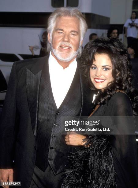 Musician Kenny Rogers and wife Wanda Miller attend the 22nd Annual American Music Awards on January 30, 1995 at Shrine Auditorium in Los Angeles,...