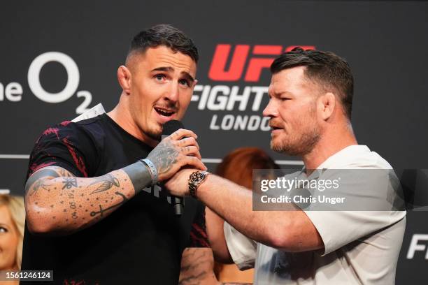 Tom Aspinall of England is interviewed by Michael Bisping during the UFC Fight Night ceremonial weigh-in at The O2 Arena on July 21, 2023 in London,...