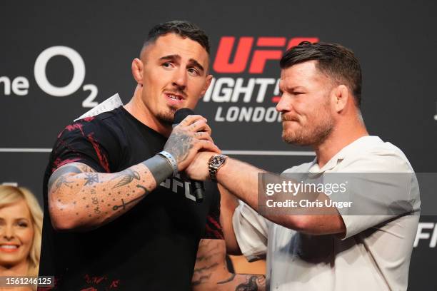 Tom Aspinall of England is interviewed by Michael Bisping during the UFC Fight Night ceremonial weigh-in at The O2 Arena on July 21, 2023 in London,...