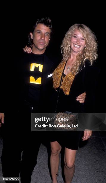 Producer Jon Peters and wife Christine Forsyth attend the premiere of 'Batman' on June 19, 1989 at Mann Bruin Theater in Westwood, California.