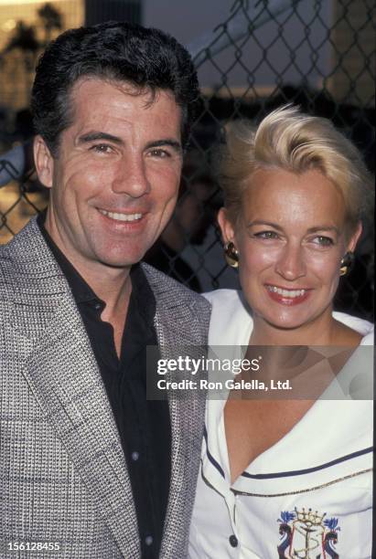Personality John Walsh and wife Reve Drew attending 'FOX TV Affiliates Party' on July 11, 1989 in Marina Del Rey, California.