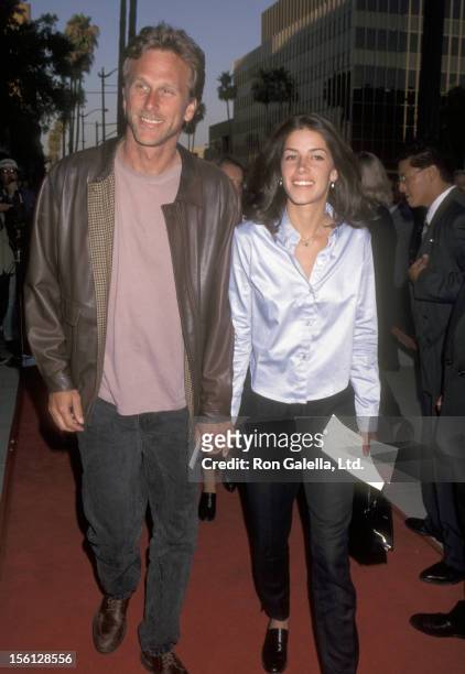 Actor Peter Horton and wife Nicole Deputron attend the 'Courage Under Fire' Beverly Hills Premiere on July 8, 1996 at Academy of Motion Picture Arts...