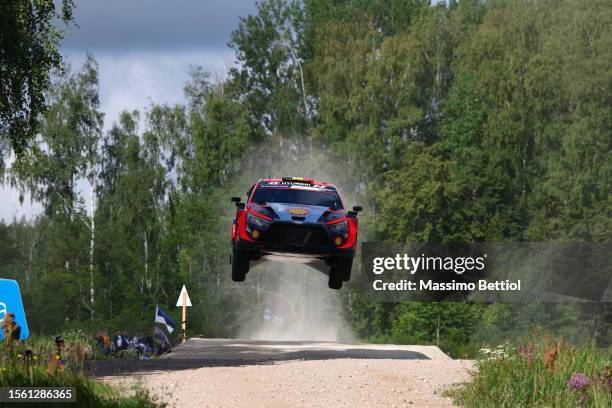 Thierry Neuville of Belgium and Martijn Wydaeghe of Belgium compete with their Hyundai Shell Mobis WRT Hyundai i20N Rally1 during Day Two of the FIA...