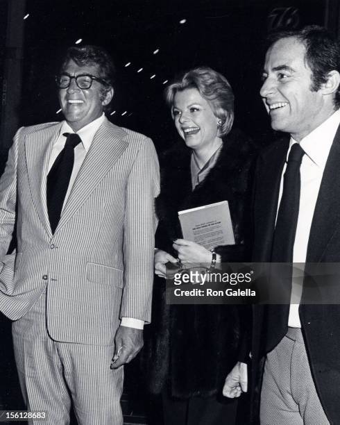 Singer Dean Martin, date Catherine Hawn and Mike Vinner being photographed on April 2, 1973 at Chasen's Restaurant in Beverly Hills, California.