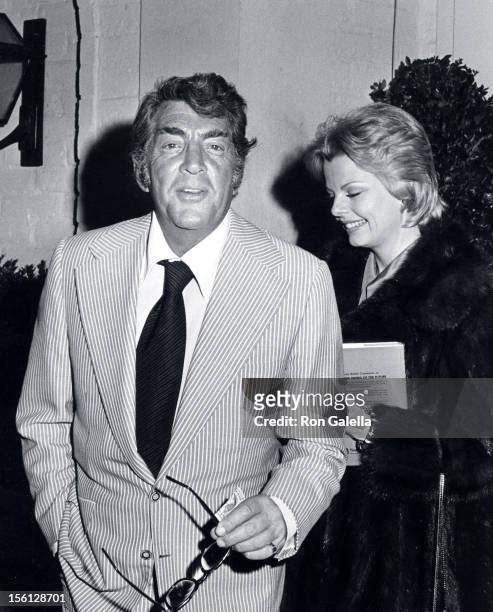 Singer Dean Martin and date Catherine Hawn being photographed on April 2, 1973 at Chasen's Restaurant in Beverly Hills, California.