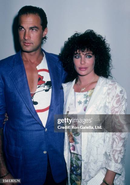 Actress Kelly LeBrock and actor Steven Seagal attending 'Opening of Melrose Art Gallery' on May 15, 1986 in Melrose, California.