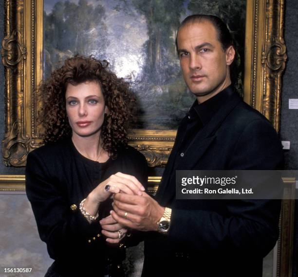 Model Kelly LeBrock and actor Steven Seagal being photographed on November 3, 1988 at Butterfield's in Los Angeles, California.