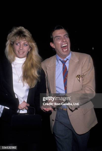 Talk Show Host Morton Downey Jr. And actress Lori Krebs being photographed on March 16, 1989 at Stringfellow's in New York City, New York.