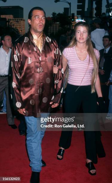 Actor Steven Seagal and Arissa Wolf attending the world premiere of 'Conspiracy Theory' on August 4, 1997 at Mann Village Theater in Westwood,...