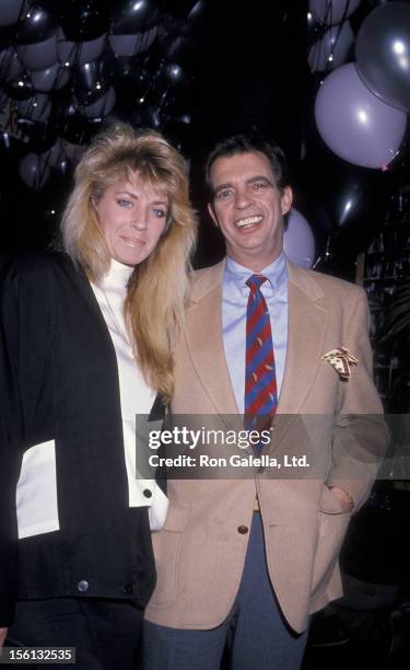 Talk Show Host Morton Downey Jr. And actress Lori Krebs being photographed on March 16, 1989 at Stringfellow's in New York City, New York.