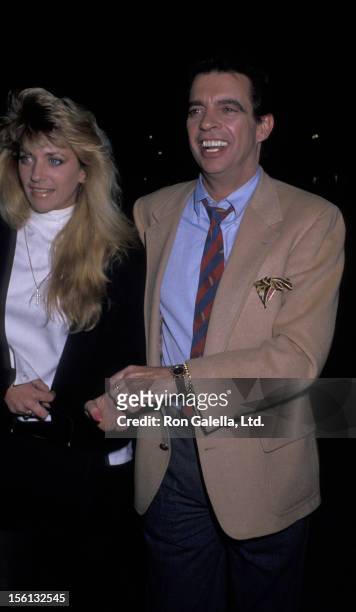 Talk Show Host Morton Downey Jr. And actress Lori Krebs being photographed on March 16, 1989 at Stringfellow's in New York City, New York.