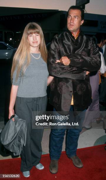 Actor Steven Seagal and Arissa Wolf attending the premiere of 'Free Tibet' on September 9, 1998 at the Showcase Theater in Hollywood, California.