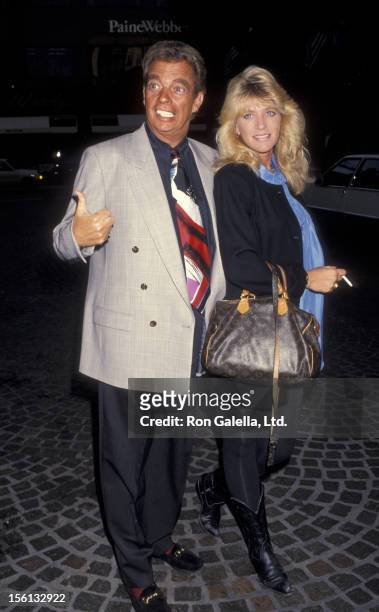 Talk Show Host Morton Downey Jr. And actress Lori Krebs attending 'BMI Songwriters Awards Dinner' on May 18, 1993 at the Beverly Wilshire Hotel in...