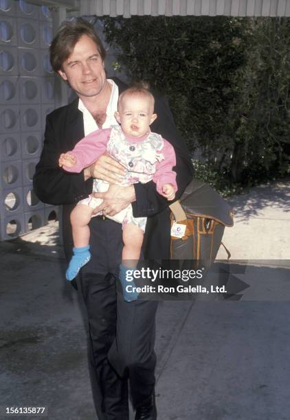 Actor Stephen Collins and daughter Kate Collins on July 14, 1990 arriving at the Los Angeles International Airport in Los Angeles, California.