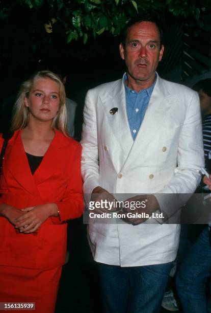 Actor John Cleese and daughter Camilla Cleese being photographed on July 15, 1988 at Spago Restaurant in West Hollywood, California.