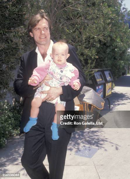Actor Stephen Collins and daughter Kate Collins on July 14, 1990 arriving at the Los Angeles International Airport in Los Angeles, California.