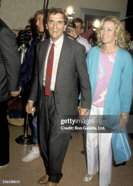 Actor Harry Dean Stanton and singer/actor Michelle Phillips attend the 'At Close Range' Westwood Premiere on April 16, 1986 at Mann Bruin Theatre in...