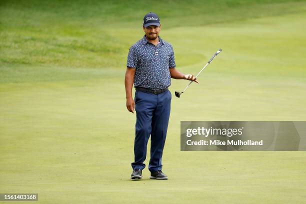 Fabian Gomez of Argentina reacts to a putt on the ninth hole during the second round of the Price Cutter Charity Championship presented by Dr Pepper...