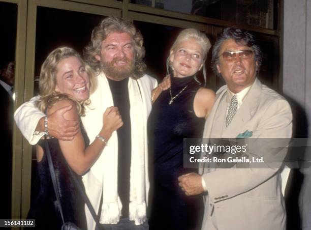 Writer Joe Eszterhas and date Naomi Baca and Producer Robert Evans and guest Christine Hoffman attend the 'Sliver' Westwood Premiere on May 19, 1993...