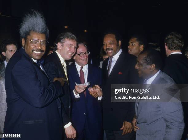 Fight Promoter Don King, businessmen Donald Trump and Malcolm Forbes, Jesse Jackson and John H. Johnson attend Mike Tyson vs. Michael Spinks Boxing...
