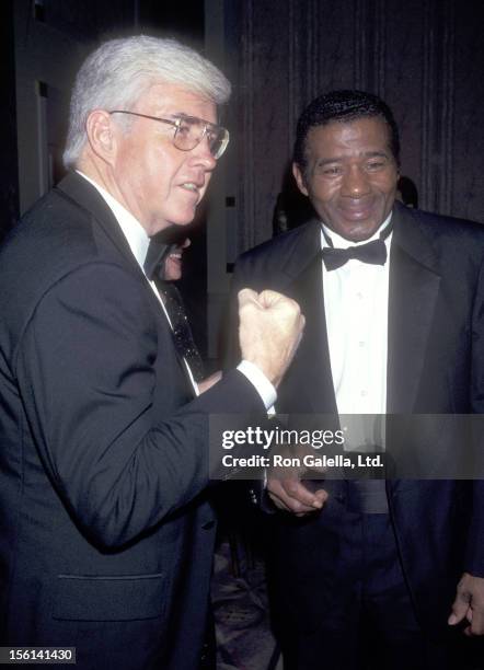 Politician Jack Kemp and athlete Floyd Patterson attend the Congress of Racial Equality 13th Annual Martin Luther King Ambassadorial Reception and...