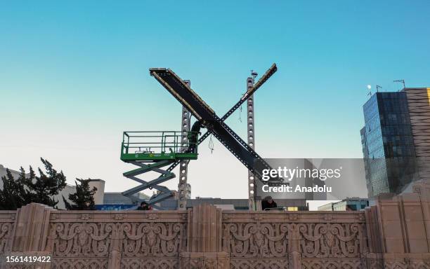 The ''X'' sign is being installed on the top of building of Twitter Headquarters in San Francisco, California, United States on July 28, 2023.