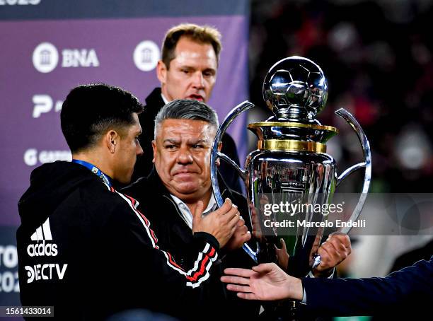 Claudio Tapia president of Argentine Football Association gives the trophy to Enzo Perez of River Plate after winning the Liga Profesional 2023 at...