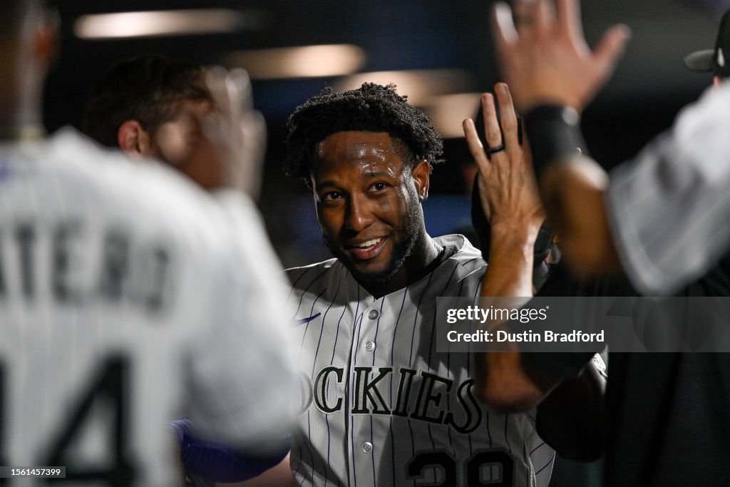 Colorado Rockets Basketball Jurickson Profar of the Colorado Rockies celebrates in the dugout ...