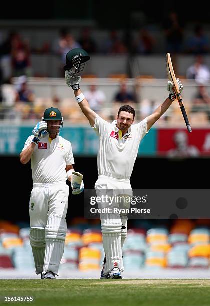 Ed Cowan of Australia celebrates after reaching maiden test century during day four of the First Test match between Australia and South Africa at The...