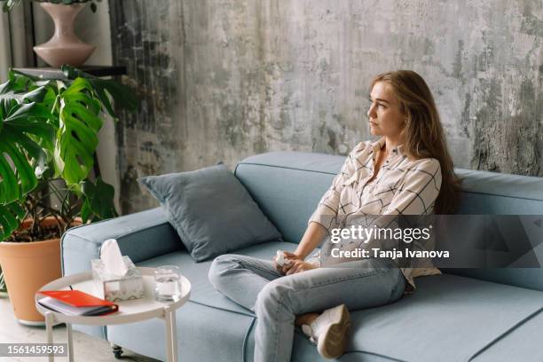frustrated young woman at an appointment with a professional psychotherapist. conversation with psychologist for therapy, trauma and mental health support. consultation, psychology, mental health concept. - post traumatic stress disorder stock pictures, royalty-free photos & images