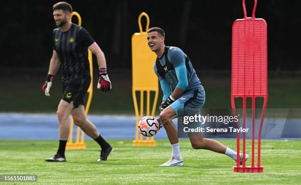 Goalkeeper Karl Darlow smiles as he grabs the ball during the Newcastle United Pre Season Training session at PACE Academy on July 21, 2023 in...