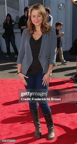Actress Megyn Price attends the 14th Aniversary Of P.S. Arts Express Yourself at the Barker Hangar Santa Monica Airport on November 11, 2012 in Santa...