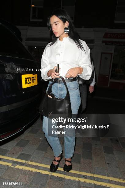Dua Lipa seen on a night out at Chiltern Firehouse on July 21, 2023 in London, England.